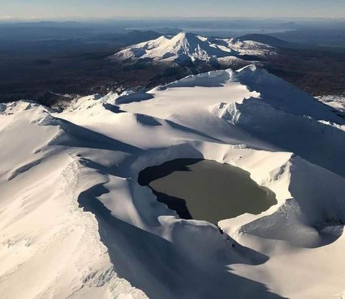 Summit snowfields and Crater Lake of Mt.Ruapehu