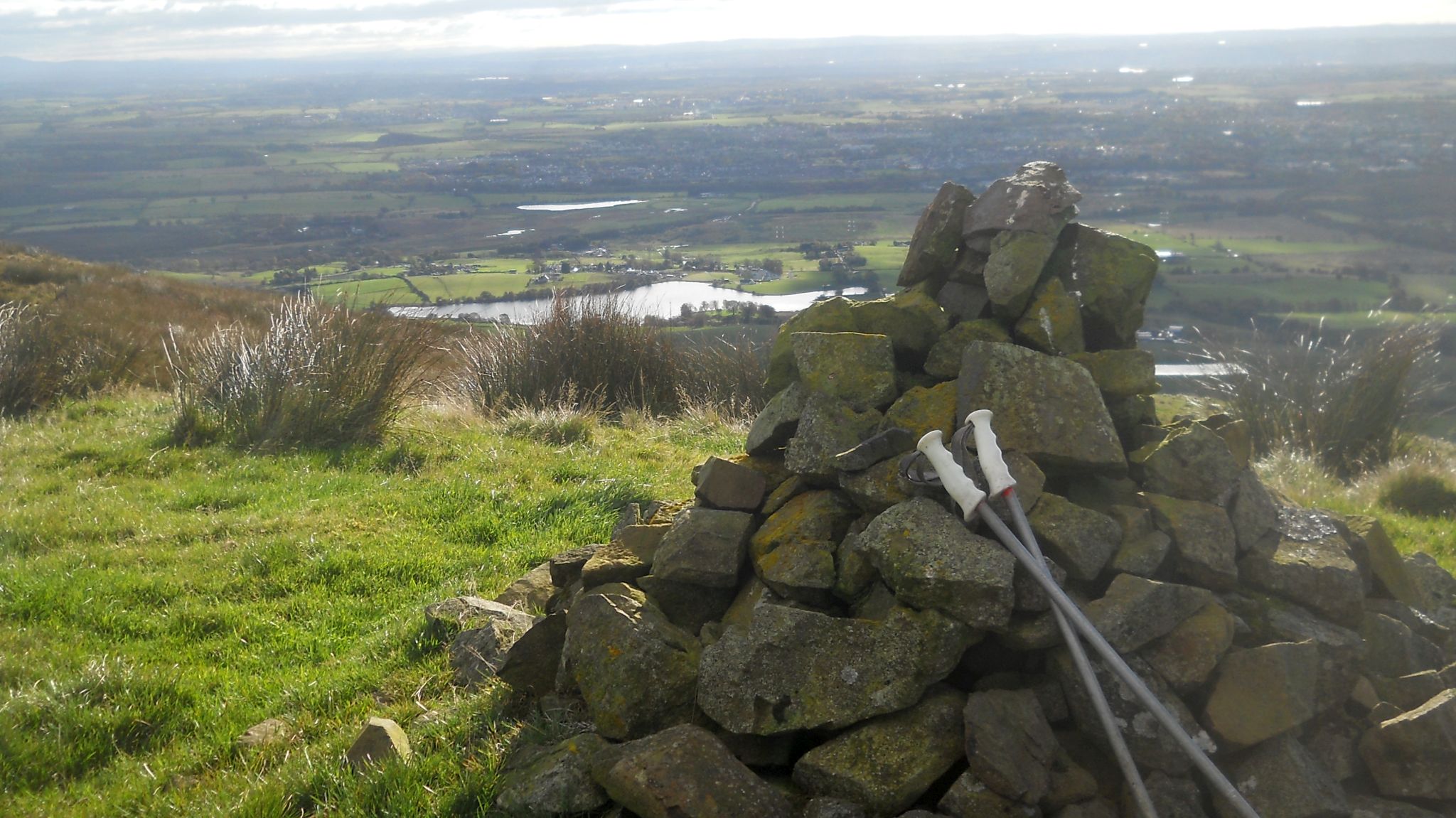 Woodburn Reservoir and Antermony Loch from cairn on Brown Hill